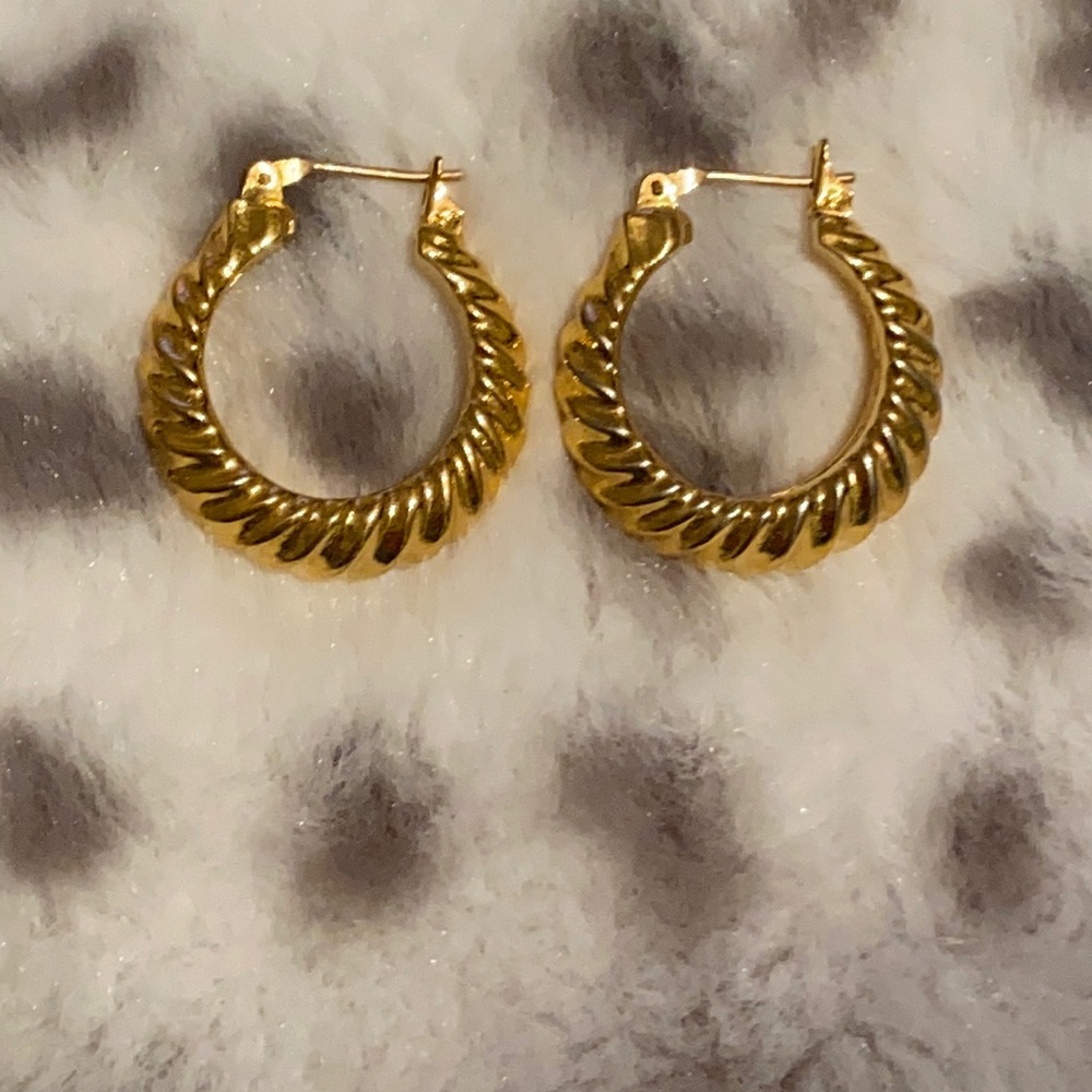 Gold hoop earrings.